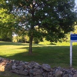 Machamux Park - Stone fence surrounding open lawn