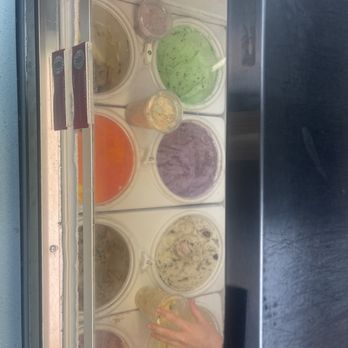 Sprinkles Creamery - a person reaching for something - Ice Cream & Frozen Yogurt Near Me - Mountain Home, Idaho Sprinkles Creamery - a person reaching for something - Ice Cream & Frozen Yogurt Near Me - Mountain Home, Idaho