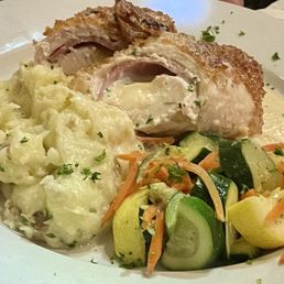 Chicken cordon bleu with mashed potatoes and veggies
