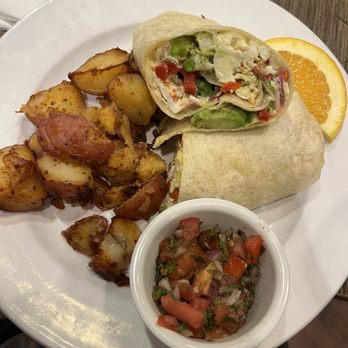 Famous Toastery - Daybreak Burrito w/ breakfast potatoes - Breakfast & Brunch Near Me - Charlotte, North Carolina Famous Toastery - Daybreak Burrito w/ breakfast potatoes - Breakfast & Brunch Near Me - Charlotte, North Carolina