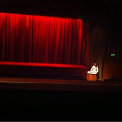 Cottage Road Cinema - During intermission (after the adverts and before the movie), someone sells concessions at the front.