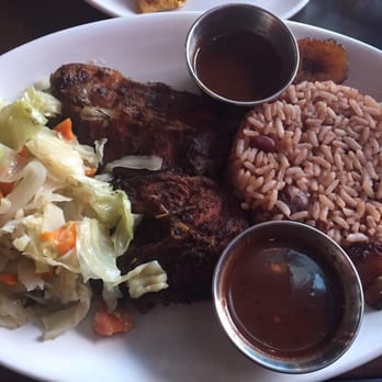 Ja' Grill Hyde Park - Jerk Catfish. Sides: cabbage & carrots, plantains, and rice and beans. Yummers!! - Lounges Near Me - Chicago, Illinois Ja' Grill Hyde Park - Jerk Catfish. Sides: cabbage & carrots, plantains, and rice and beans. Yummers!! - Lounges Near Me - Chicago, Illinois