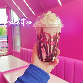 Bussin Burger - a hand holding a cup of ice cream - Burgers Near Me - Calgary, Alberta Bussin Burger - a hand holding a cup of ice cream - Burgers Near Me - Calgary, Alberta