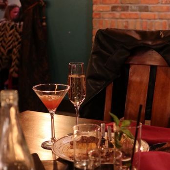 Est.1864 Noir Bar & Restaurant - Here Kitty Kitty (Mi Campo Blanco tequila, passionfruit liqueur, guava nectar, lime juice, maté syrup, bubbles.) - Cocktail Bars Near Me - Bozeman, Montana