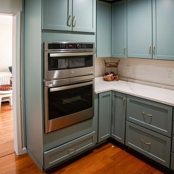 Titus General Contractor - a kitchen with blue cabinets - General Contractors Near Me - Bowie, Maryland Titus General Contractor - a kitchen with blue cabinets - General Contractors Near Me - Bowie, Maryland