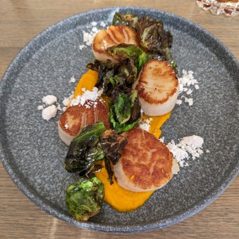 Madam - The large, seared scallops with pumpkin mousse and Brussels sprout leaves were exquisite. - New American Near Me - Birmingham, Michigan Madam - The large, seared scallops with pumpkin mousse and Brussels sprout leaves were exquisite. - New American Near Me - Birmingham, Michigan