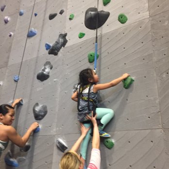 Cirque Climbing - Rosie getting a lift from Auntie Natalie - Gyms Near Me - Lacey, Washington Cirque Climbing - Rosie getting a lift from Auntie Natalie - Gyms Near Me - Lacey, Washington