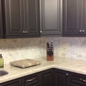 Architectual Ceramics - a kitchen with black cabinets - Interior Design Near Me - Falls Church, Virginia Architectual Ceramics - a kitchen with black cabinets - Interior Design Near Me - Falls Church, Virginia