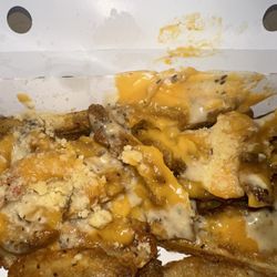 Rally’s - Garlic cheese fries