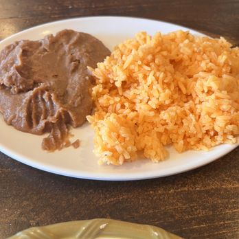 El Sol - Rice and refried beans side - Latin American Near Me - Parksley, Virginia El Sol - Rice and refried beans side - Latin American Near Me - Parksley, Virginia