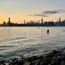 Brooklyn Waterfront - Sunset over Manhattan from the beach at Bushwick Inlet Park.