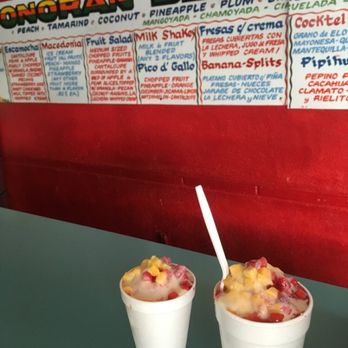 Sonoran Delights - Raspados size small on left medium on right. Mango, strawberry, vanilla ice cream and lechera. - Mexican Near Me - Tucson, Arizona Sonoran Delights - Raspados size small on left medium on right. Mango, strawberry, vanilla ice cream and lechera. - Mexican Near Me - Tucson, Arizona