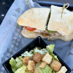 Marker 24 Riverfront Grille - Smothered Fish Sandwich and Side Caesar Salad
