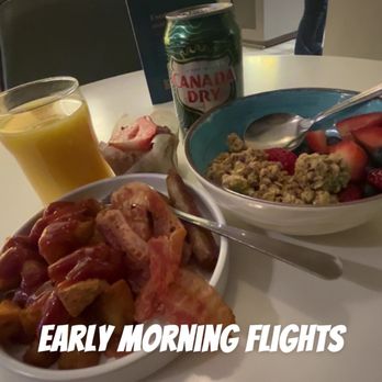 Escape Lounges - Sausage, bacon, potatoes, fruit, granola, strawberry muffin, orange juice and soda - Airport Lounges Near Me - Oakland, California