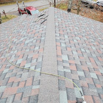 Yr Contractor - the roof of a home with a new shingled roof - Handyman Near Me Yr Contractor - the roof of a home with a new shingled roof - Handyman Near Me
