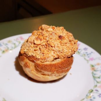 Her Place - a plate with a pastry on it - French Near Me - Philadelphia, Pennsylvania Her Place - a plate with a pastry on it - French Near Me - Philadelphia, Pennsylvania