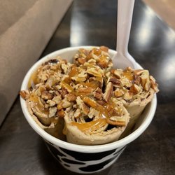 Coffee rolled ice cream with brownie bits, pecans, & caramel sauce (I created my own)