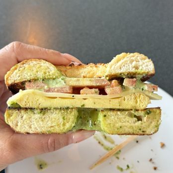 Tandem Bagel Company - savory breakfast sandwich on a cheesy garlic bagel - Coffee & Tea Near Me - Florence, Massachusetts Tandem Bagel Company - savory breakfast sandwich on a cheesy garlic bagel - Coffee & Tea Near Me - Florence, Massachusetts