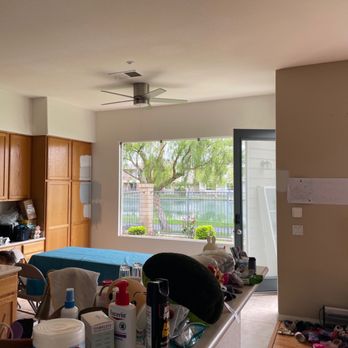 Tesla Windows - a kitchen with lots of clutter - Windows Installation Near Me - Fullerton, California