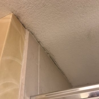 Hilton Branson Convention Center - Mold around the tile in the shower. - Hotels Near Me - Branson, Missouri Hilton Branson Convention Center - Mold around the tile in the shower. - Hotels Near Me - Branson, Missouri