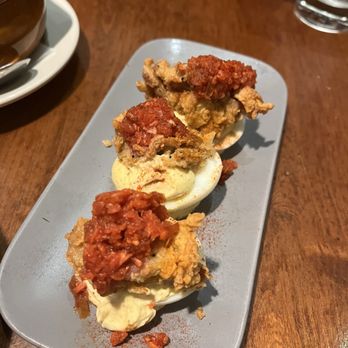 Rudy Royale - Signature fried oyster on the deviled egg! Great flavors. - Chicken Shop Near Me - Charleston, South Carolina Rudy Royale - Signature fried oyster on the deviled egg! Great flavors. - Chicken Shop Near Me - Charleston, South Carolina