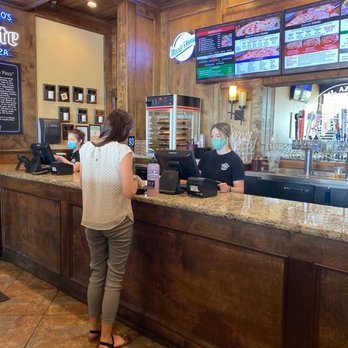 Barro's Pizza - a woman at the counter - Pizza Near Me - Phoenix, Arizona Barro's Pizza - a woman at the counter - Pizza Near Me - Phoenix, Arizona