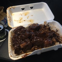 Bland oxtails with rice and peas.