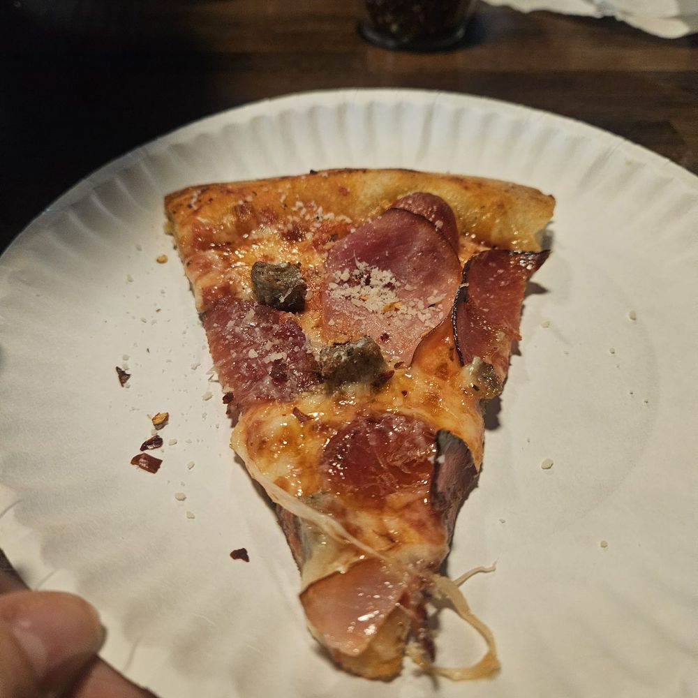 St. Laurent Pizza - Slice of carnivore (for size) - Pizza Near Me - Shreveport, Louisiana St. Laurent Pizza - Slice of carnivore (for size) - Pizza Near Me - Shreveport, Louisiana