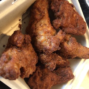 Nguyen's Kitchen - Chicken wings with their special black sauce which was extremely salty - Vietnamese Near Me - Costa Mesa, California