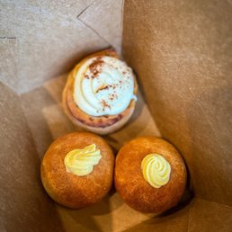 Japanese custard bread and a cinnamon roll Japanese custard bread and a cinnamon roll