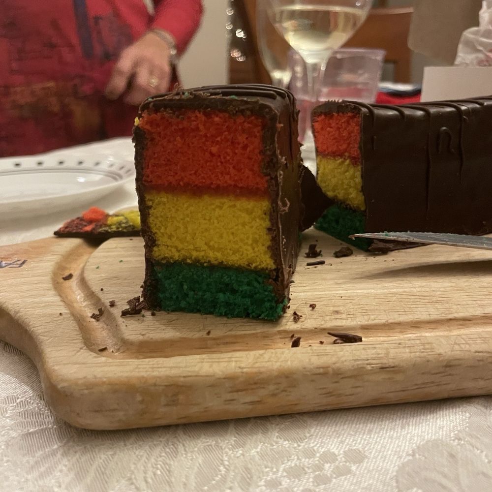 Rainbow cookie bar after being cut. Rainbow cookie bar after being cut.