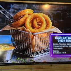 The Bamboozer - Beer-battered onion  rings with signature house sauce