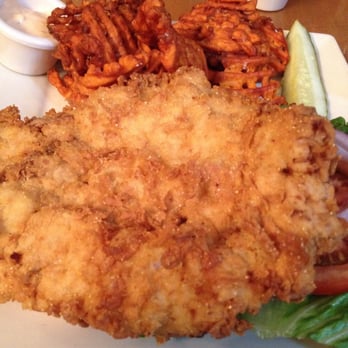 Fire By The Monon - The breaded pork tenderloin and sweet potato fries. Wowsa! - American Near Me - Indianapolis, Indiana