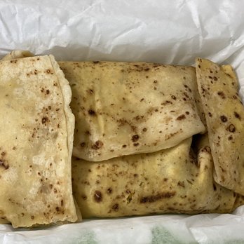 Tropical Bites - Roti with Goat - Caribbean Near Me - Manassas, Virginia Tropical Bites - Roti with Goat - Caribbean Near Me - Manassas, Virginia