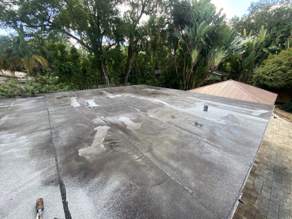 Slide of Tropical Roofing Services