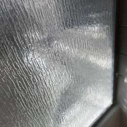 Puroserve - Noticeable dinginess to the right of the picture due to HARD water build up.