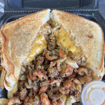It's Nola Baaaby - Crab grilled cheese with Cajun queso and crawfish tails on top of the fries! - Cajun/Creole Near Me - Jersey Village, Texas It's Nola Baaaby - Crab grilled cheese with Cajun queso and crawfish tails on top of the fries! - Cajun/Creole Near Me - Jersey Village, Texas