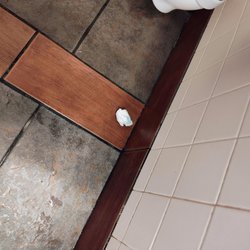 Jimmy John's - Urine on the floor with toilet tissue