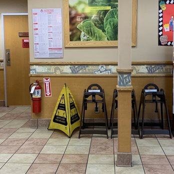 Wendy's - a restaurant with chairs and tables - Burgers Near Me - Commack, New York