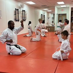 Traditional Karate and Aikido - This is the whole class doing blocks from the floor.