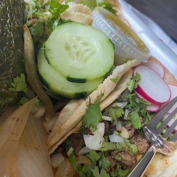 Las Americas - a plate of tacos with cucumbers and onions - Grocery Near Me - Rock Hill, South Carolina