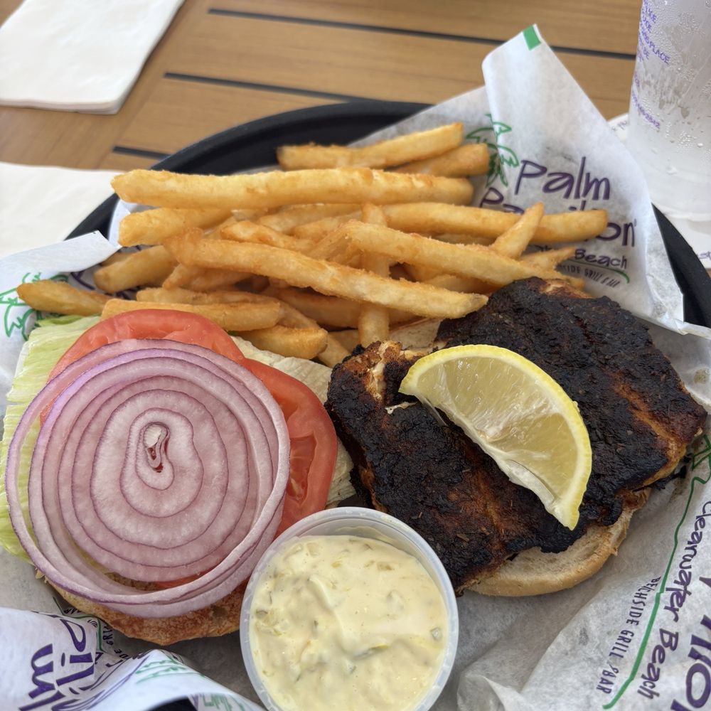 Classic grouper sandwich and fries Classic grouper sandwich and fries