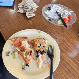 Tiny slices of pizza the size of a plastic fork Tiny slices of pizza the size of a plastic fork