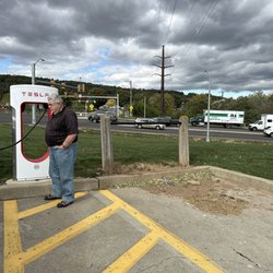 Tesla Super Charger - Horse tie beside the EV charger.