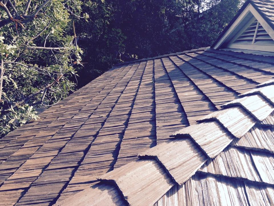 Slide of Douglas Cote Roofing