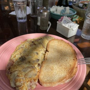 Ida Red's Cottage - The gigantic Montana egg scramble. Big enough for three people. - Breakfast & Brunch Near Me - Saugatuck, Michigan Ida Red's Cottage - The gigantic Montana egg scramble. Big enough for three people. - Breakfast & Brunch Near Me - Saugatuck, Michigan
