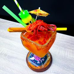 Mamacitas Cantina - Our Clásicas Mamacitas Michelada is a spicy combination with tajín, chamoy and a few gummies for decoration.