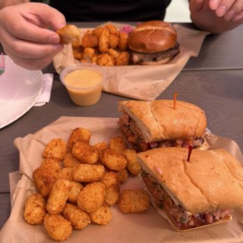 Satchmo's - Andouille Poboy Plate and Brisket Sandwich Plate - Cajun/Creole Near Me - Flagstaff, Arizona Satchmo's - Andouille Poboy Plate and Brisket Sandwich Plate - Cajun/Creole Near Me - Flagstaff, Arizona