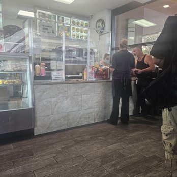 BoSa Donuts - customers waiting in line at the counter - Bakeries Near Me - Phoenix, Arizona