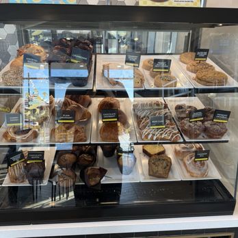 Better Buzz Coffee - Pastries, bottom from right to left that's unnamed is banana bread, pumpkin muffin, and cinnamon muffin. - Coffee & Tea Near Me - Queen Creek, Arizona
